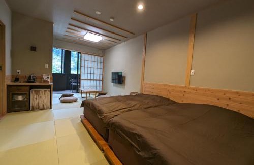 Amagase Onsen Hotel | Enjoy Family Comfort at Ryokan Tenryu with Hot Tub Access