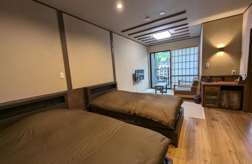 Amagase Onsen Hotel | Enjoy Family Comfort at Ryokan Tenryu with Hot Tub Access