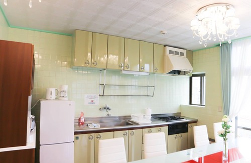 Ginowan Apartment | Oceanfront Bliss at Ryukyu Tabikan - Perfect for Families