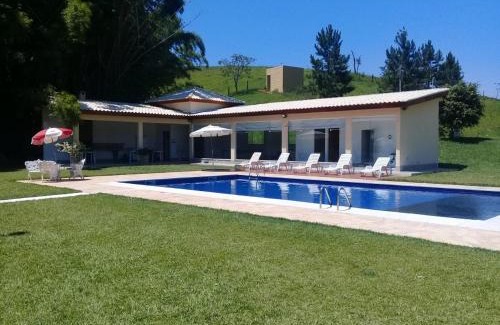 Santa Isabel House | Relax at Sítio Água Viva: Pet-Friendly Oasis with Pool