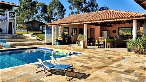 Quadra House | Relax at Sítio São Luiz: Nature, Ocean Views & Pool