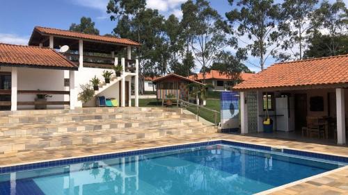 Quadra House | Relax at Sítio São Luiz: Nature, Ocean Views & Pool