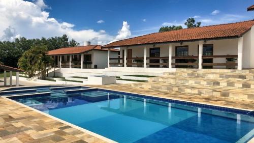 Quadra House | Relaxing Retreat with Pool and Family-Friendly Amenities