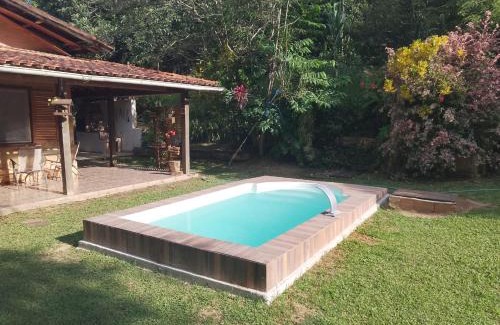 Silva Jardim House | Idyllic Retreat at Sítio Completo with River Views