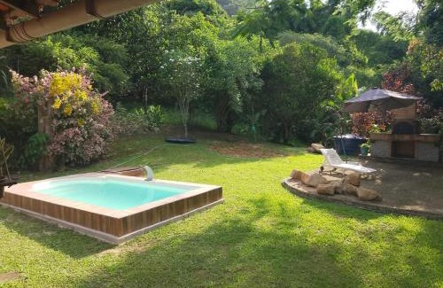 Silva Jardim House | Idyllic Retreat at Sítio Completo with River Views