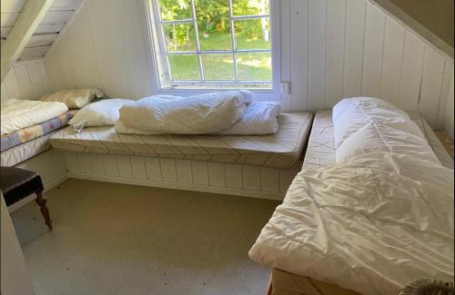 Grimstad Apartment | Idyllic Sørlandshus i skjærgården Anneks with Private Beach