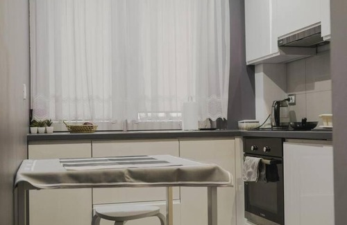 Kokoszki Apartment | Bright Balcony Room with Pet and Child-Friendly Amenities