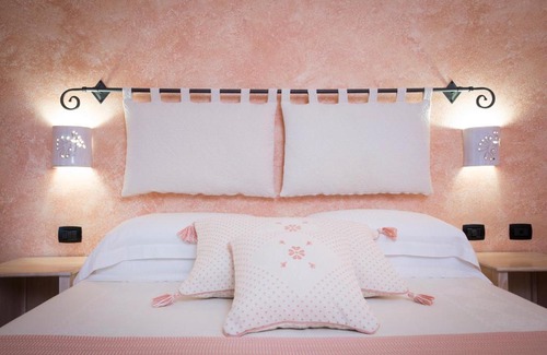 Gonnesa House | Discover S'Anninnia: Oceanfront Retreat with Family-Friendly Perks