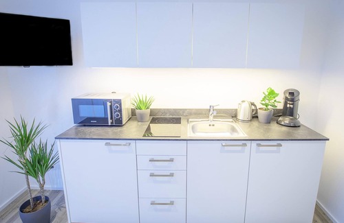 Bruhl-Guterbahnhof Apartment | Cozy Apartment with Balcony and Family-Friendly Amenities