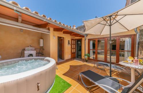 Maria de la Salut House | Family-Friendly Holiday Home S'Arraval with Hot Tub