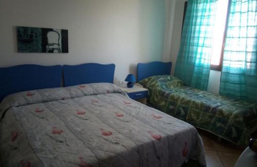 Piscinas Bed & Breakfast | Cozy SA DOMU SARDA: Oceanfront Retreat with Pool Access