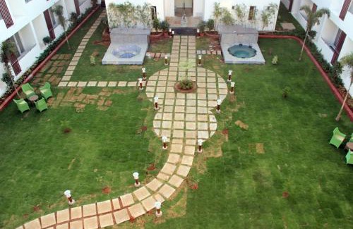 Courtallam Hotel | Discover Comfort at Saaral Resorts & Hotels with Pool & Spa