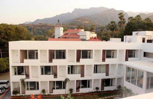 Courtallam Hotel | Discover Comfort at Saaral Resorts & Hotels with Pool & Spa