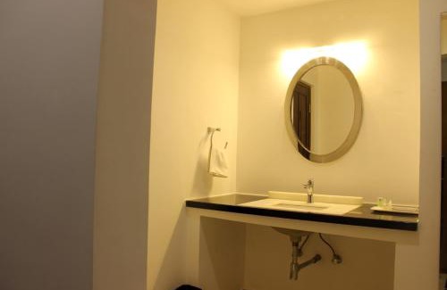 Courtallam Hotel | Discover Comfort at Saaral Resorts & Hotels with Pool & Spa