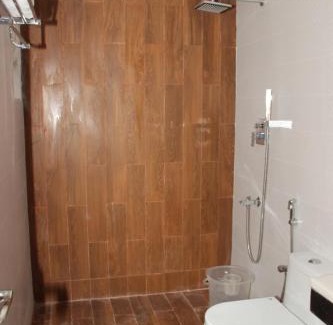 Courtallam Hotel | Discover Comfort at Saaral Resorts & Hotels with Pool & Spa