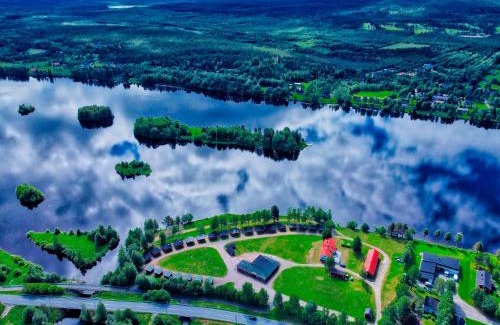 Rovaniemi House | Relaxing Saarituvat Cottages with Private Beach & Hot Tub