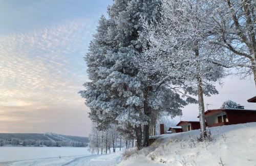 Rovaniemi House | Relaxing Saarituvat Cottages with Private Beach & Hot Tub