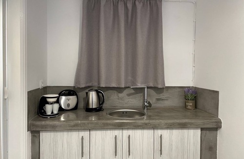 Perissa Apartment | Relax at Sabbia Calda Apartment Steps from Black Beach