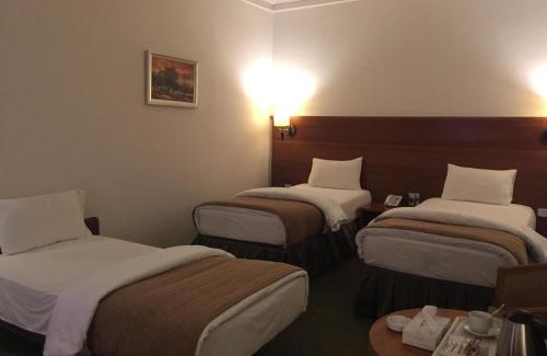 Suwailih Hotel | Comfortable Stay at Sadeen Amman Hotel with Pool & Dining