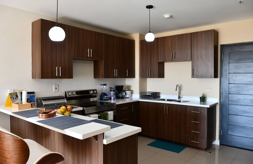 New Kingston Apartment | Peaceful Stay with Family-Friendly Amenities & Top Ratings