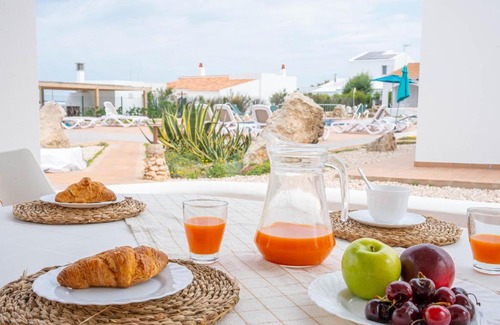 Cap d'Artrutx Apartment | Discover Villas Rymar: Family-Friendly with Pool & Breakfast