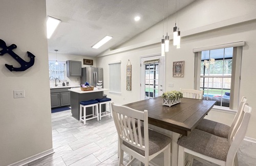 West Pensacola House | Sail Away: Poolside Fun with Game Room & Karaoke