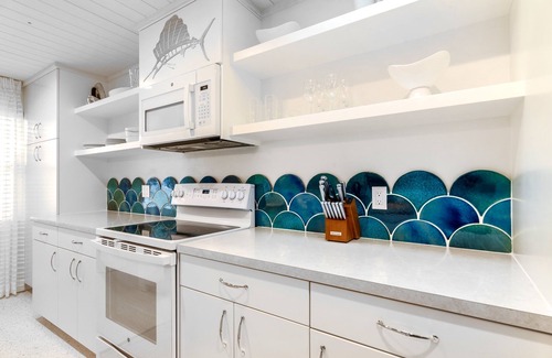 Whitney Beach Cottage | Unwind at Sailfish Gulf Suites #4 - Garden Views & Beach Access