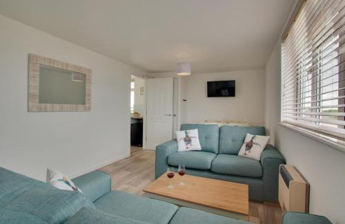 Ringstead House | Cozy Sailing Club Bungalow with Family and Pet Amenities