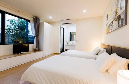 Phuoc Thuan Villa | Discover Saki Vili Ho Tram: Pool, Spa & Breakfast Awaits!