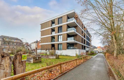 Bayreuth Apartment | Experience Sali Homes: Riverside Apartment with Ocean Views