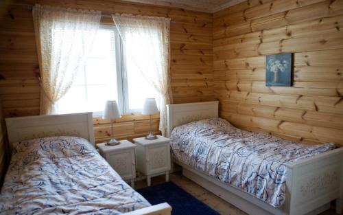 Langelmaki House | Tranquil Salkolahti Lomamökit with Private Beach Access