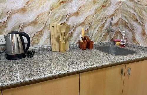 Msasani Apartment | Discover Salma Studio Apartments - Family-Friendly Retreat