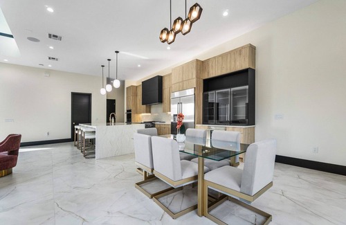 Juno Beach House | SALT HAUS 6BD 6BA Putting green, heated pool and spa. WALK TO BeACH!2025 build!