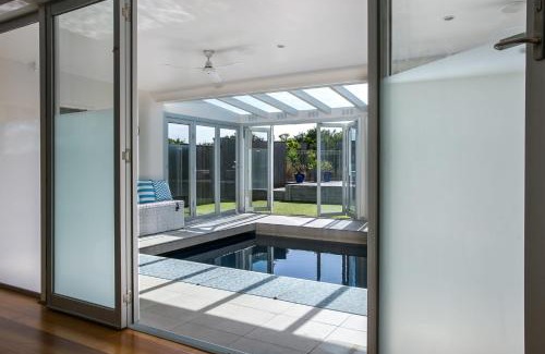 St. Andrews Beach House | Experience Saltaire: Pet-Friendly Retreat with a Pool