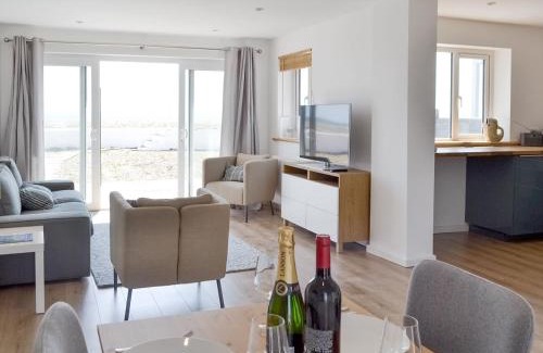 South Hayling House | Experience Salty Lodge: 4-Star Retreat with Hot Tub & More