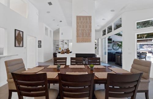 Palm Harbor House | Discover SALTY TURTLE: Poolside Retreat with Tiki Bar