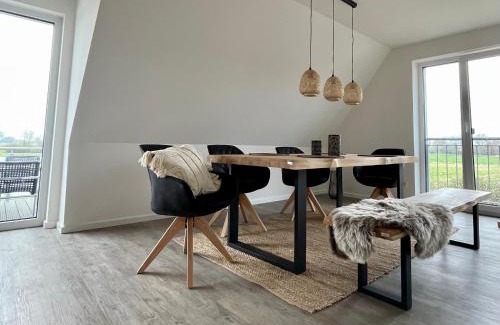 Westerdeichstrich Apartment | Experience Comfort at Salzwiesenblick - Rated 9/10