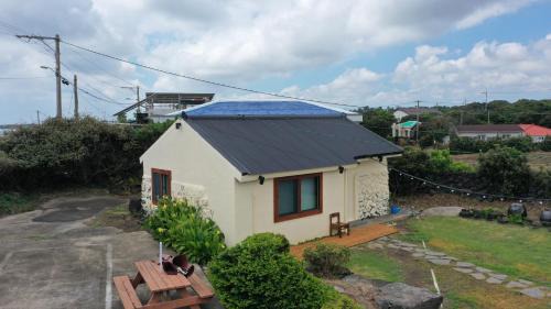 Seongsan House | Oceanfront Retreat at SamDalChae with Hot Tub & Views