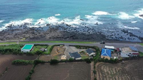 Seongsan House | Oceanfront Retreat at SamDalChae with Hot Tub & Views