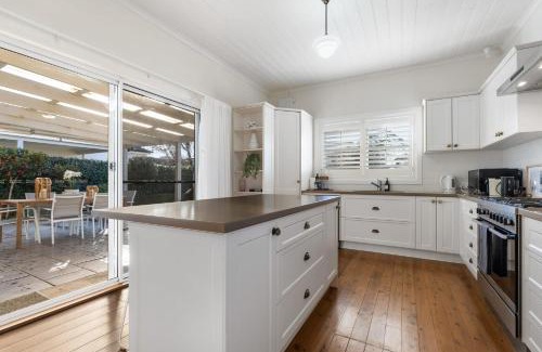 Orange House | Experience Sampson Cottage - Historic Stay with Family Amenities