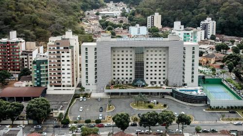 Horto Hotel | Enjoy Oceanfront Comfort at San Diego Suites Ipatinga