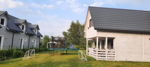 Dziwnowek Ski Chalet | Relax at San Escobar Dziwnówek: Ocean Views & Pool