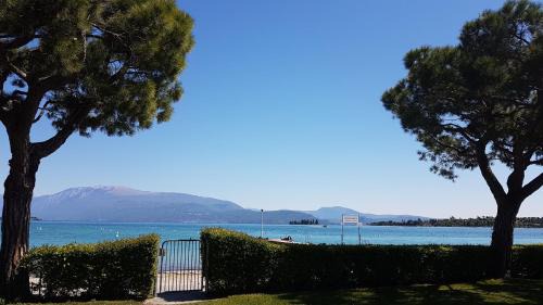 Pieve Vecchia Apartment | Serene San Felice: Oceanfront Retreat with Private Beach