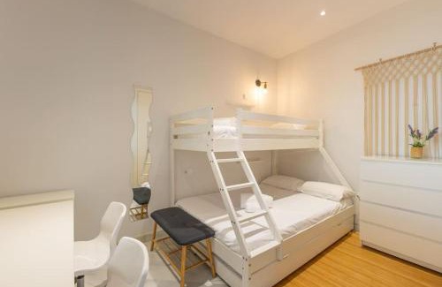 Historical Center Apartment | Discover San Isidoro Skyview: Family-Friendly Retreat
