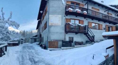 Oulx Apartment | Inviting San Marco Farmhouse with Scenic Views & Family-Friendly
