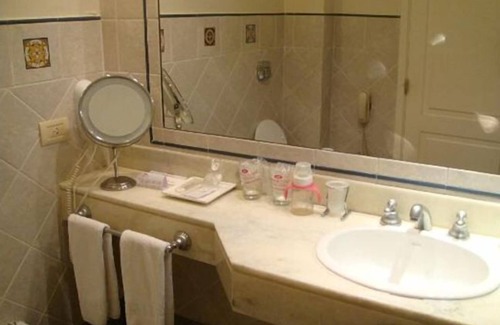 Alta Gracia Hotel | Relax at San Miguel Plaza Hotel with Pool & Spa Amenities