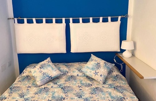 Capo Coda Cavallo Apartment | Seaside Retreat at San Teodoro Punta Est with Child-Friendly Amenities