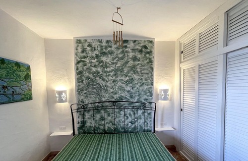 Capo Coda Cavallo Apartment | Beachfront Getaway at San Teodoro Punta Est Giardino