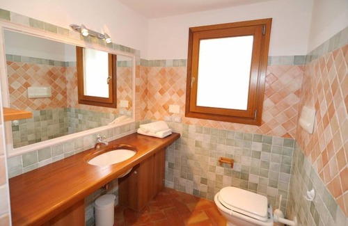 Luddui House | San Teodoro Villa with Pool, Steps from the Ocean