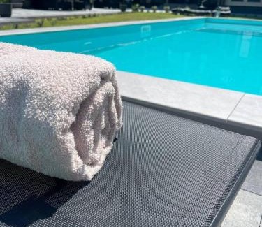 Shaian House | Relax at Sandal: Oceanfront Bliss with Spa & Pool Access